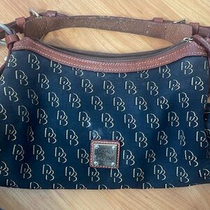 Dooney and Bourke Original design mid sized handbag